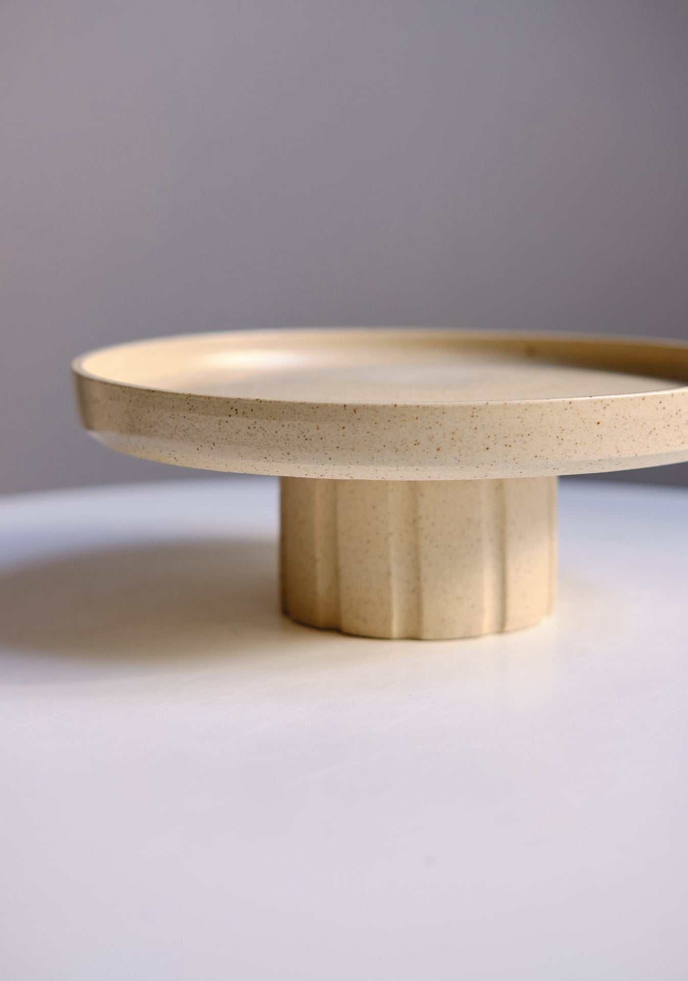 Carved cake stand