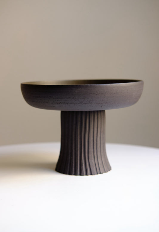 Black pedestal bowl